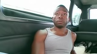 Afro guy seduced by big titted babe in the sex bus