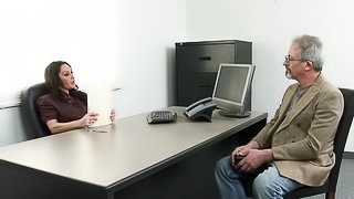 She likes the new guy so much she fucks him on top of her desk