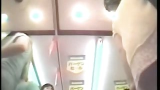 Upskirt porno video of several brunettes in a clothing shop