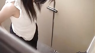 Babe in the wc got cumshot sharked by a guy behind the wall