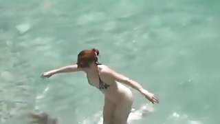 Voyeur tapes a horny nudist couple having sex at the beach