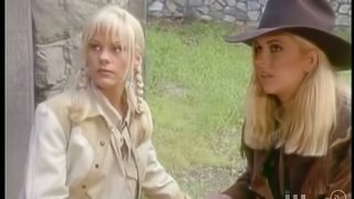 Blonde babes in cowboy clothes toy their asses and pussies