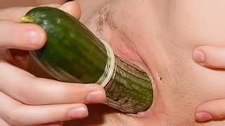 Little girl fucks huge cucumber