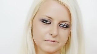 Kinky blonde with a nylon fetish riding a black dildo