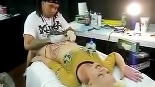 Girl get her pussy tattoo