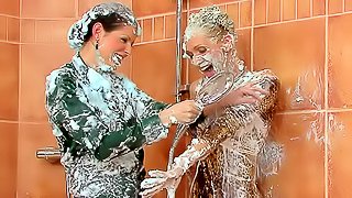 Shaving cream on clothed girls
