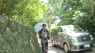 Kimono girl in a van sucks dick and gets toy fucked