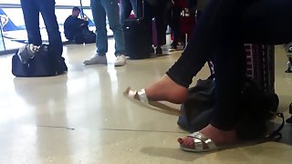 Candid sandal dangling at airport (faceshot) pt1