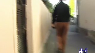 Asian babe in brown sweatpants gets a street sharking.