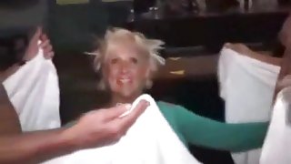 Stripper gets his dick jerked off by a bunch of girls on a female bachelor party