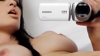 Naked attractive babe fingers herself before finishing off with a vibrator.