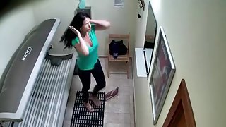 Busty Brunette in Solarium