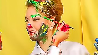 Paint covered girls in sexy clothes