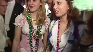 Randy slut flashing her nice tits at the mardi gras party