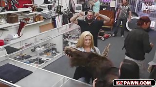 Sexy lesbian hotties shares cock inside the pawn shop