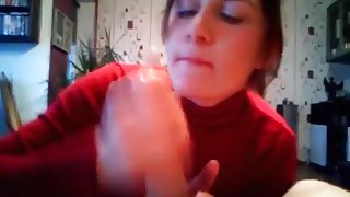 Brunette sucks her bf's cock and gives a wild handjob, until cumshot.