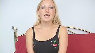 Skinny blonde teen in bed fingering her cunt in masturbation