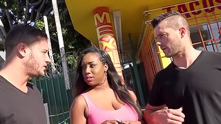 A black girl with a white dick in her pussy and one down her throat