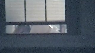 Real amateur tits voyeured through the window naked