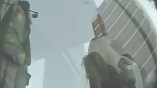 Up skirt voyeur follows two delicious  ladies