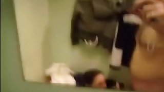 Pretty brunette girlfriend make a hell of a blowjob in men's changing room,damn