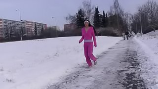 After a jog in the snow the sporty teen gets off at home