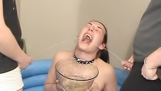 Three guys get a blowjob from a chick wearing a spiked collar