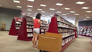 Japanese babe's sweet ass in library